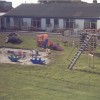 Woning terras en speeltuin Woning terras en speeltuin
